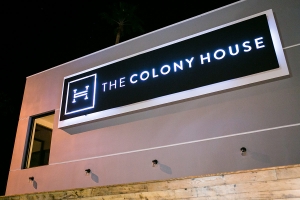 The Colony House sign outside the location