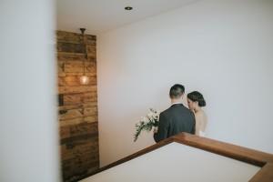 A couple walks down stairs